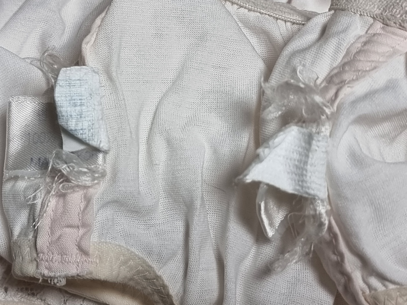 Another example of a worn-out shapewear label, a testament to its long life and comfort.
