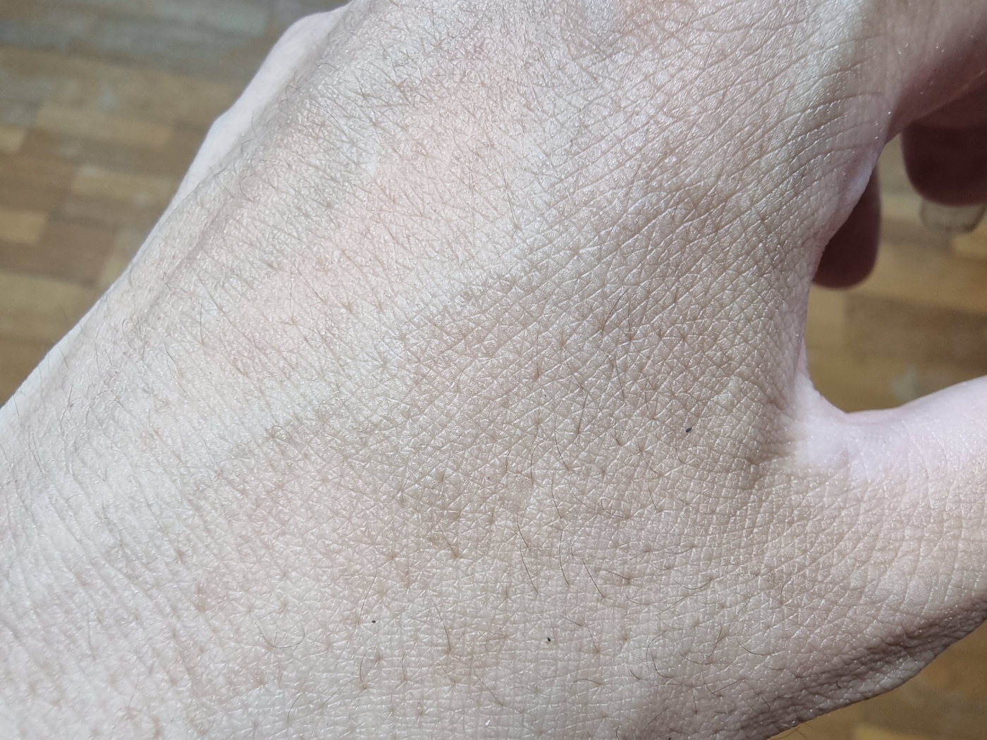 A present-day photo of the user's hand, representing the memory of that moment of discovery back in 2011.